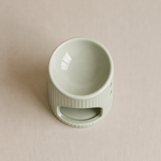 Vista superior de quemador verde para wax melts de cerámica