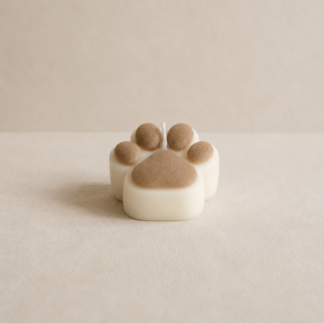 Vela decorativa de soja en forma de huella de perro y gato con almohadillas marrones