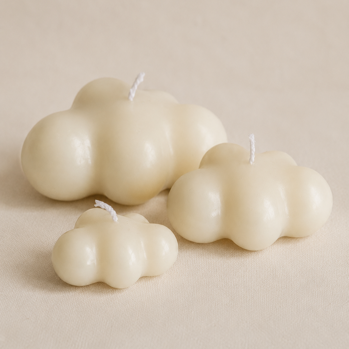 Tres velas decorativas nube de soja en tamaño grande, mediano y pequeño