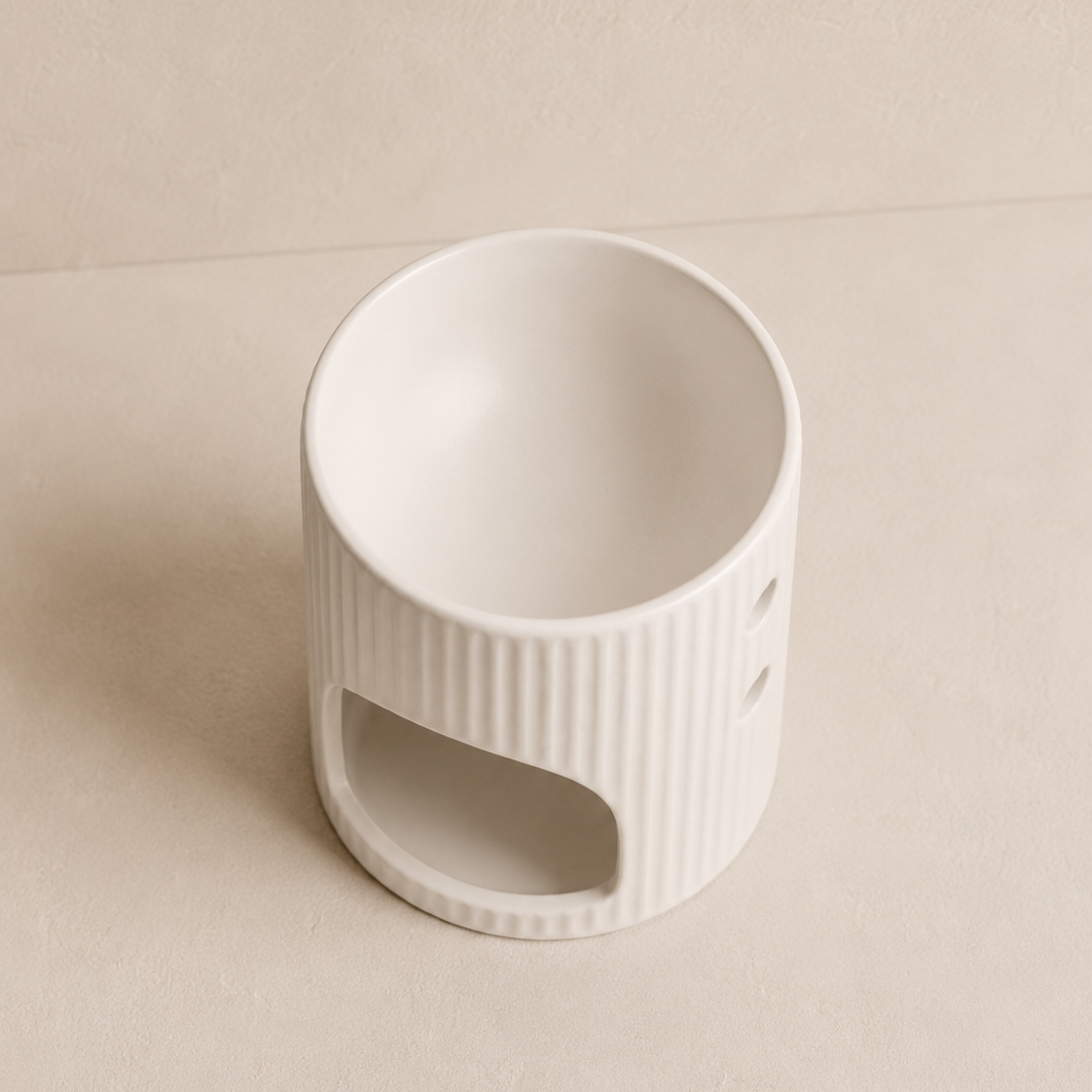Quemador de wax melts blanco visto desde arriba