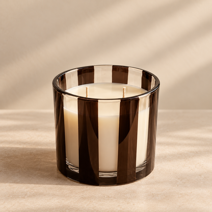 Vela aromática en vaso de cristal a rayas